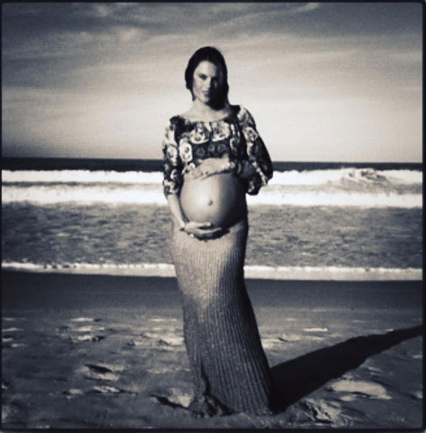 Alessandra Ambrosio pregnant on the beach