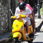 Leonardo Di Caprio yellow scooter