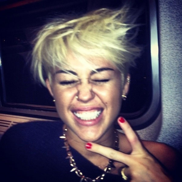 Miley Cyrus making faces with her new haircut