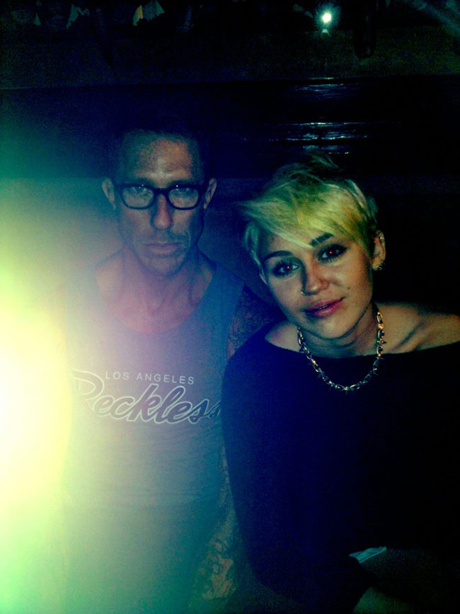 Miley Cyrus showing her new haircut and her hairstylist
