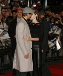 angelina jolie kissing brad pitt at beowulf premiere london