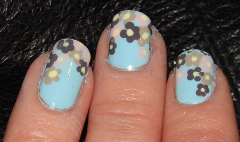 Colored flowers mint nail polish manicure
