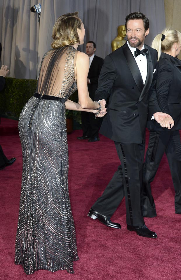 Hugh Jackman trying to escape Stacy Keibler 2013 Oscars