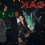 Kanye Kim Kardashian holding her baby bump