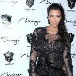 Kim Kardashian pregnant see through dress NYE