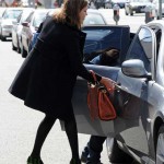 Pregnant Jessica Alba with Prada wedges Prada bag