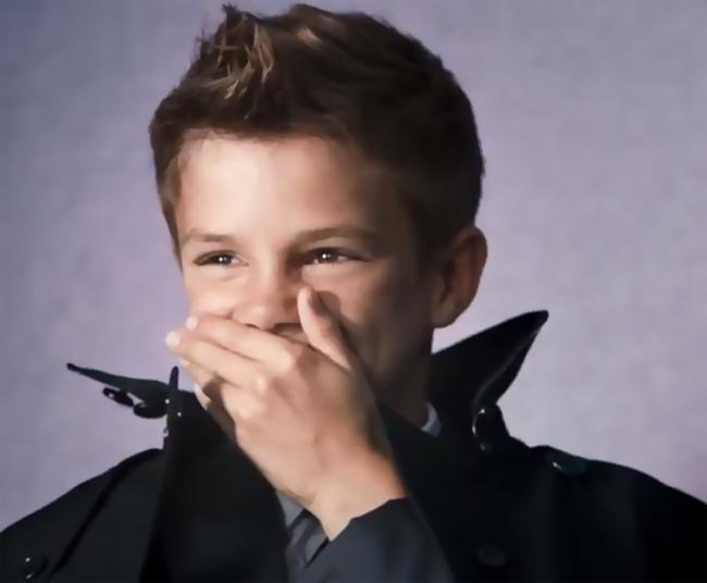 Romeo Beckham having fun in Burberry ad