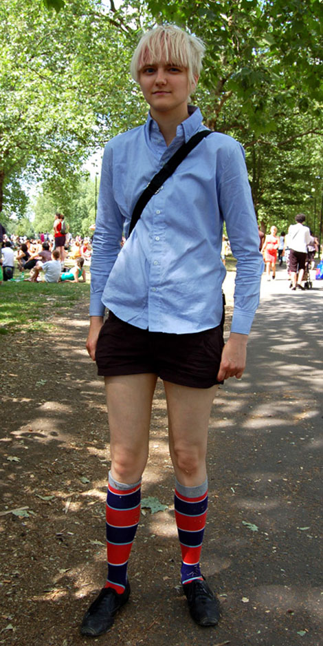 Young man wearing knee long socks